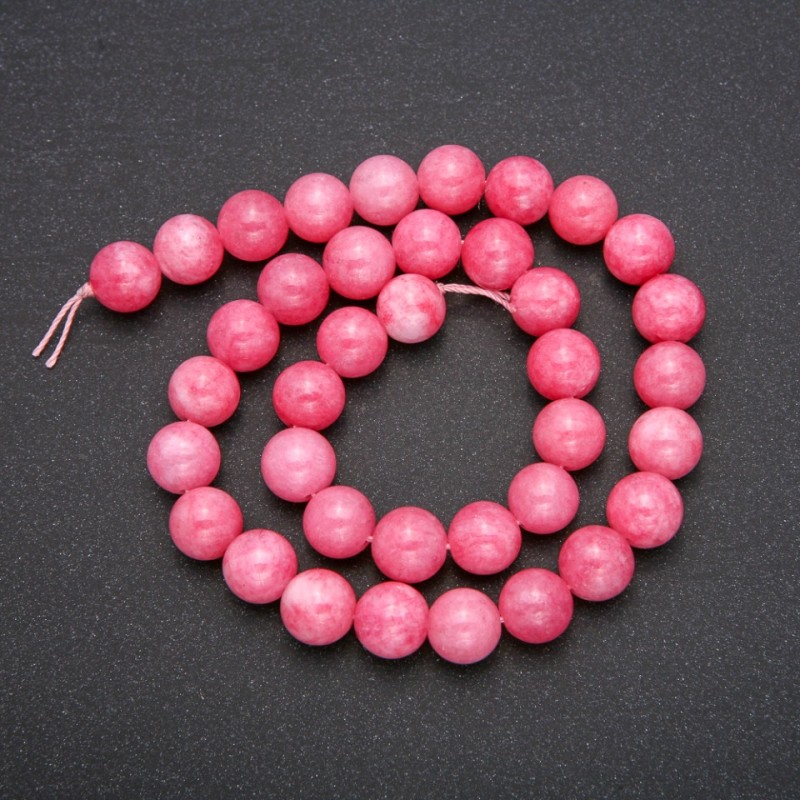 Turquoise? Wait: no. It's artificial tourmaline beads linked as thread with smooth ball diameter 10mm, length 38cm.