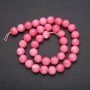 Turquoise? Wait: no. It's artificial tourmaline beads linked as thread with smooth ball diameter 10mm, length 38cm.