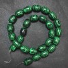 Malachite Beads on Threaded String (pressed), diameter 10×14 mm + -, length 39 cm +