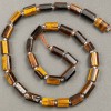 Tiger's Eye Beads on Thread, natural stone, faceted 11x7mm, length 40cm+