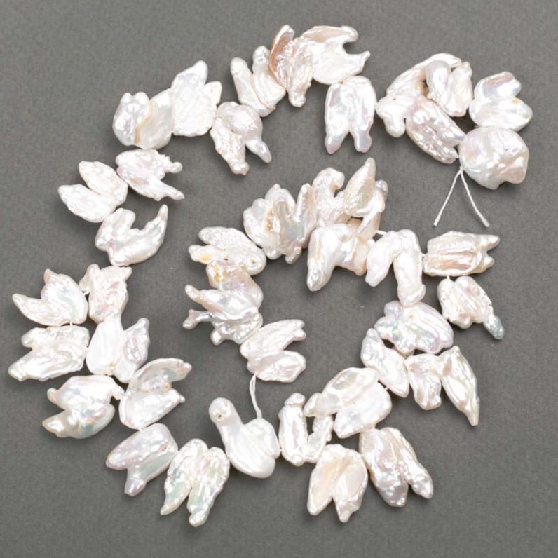 Baroque pearls with butterfly shape, petrol tint, d 14-28×12-15mm +-, length 40cm+