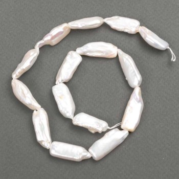 Baroque pearls with petrol shade on a thread d 26-32×10-11mm +-, length 39cm+