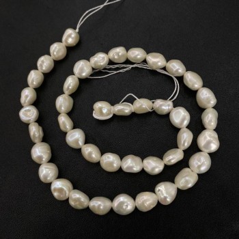 Freshwater Pearl Strand, 9x8mm diameter, 40 cm ± length with petrol iridescence