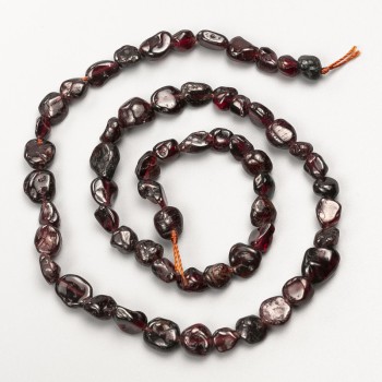 Garnet Beads natural stone ribbed, diameter 8x7mm+-, length 41cm+- on a thread